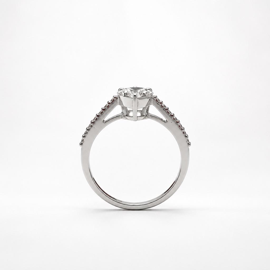 Luxurious Pear-Shaped Invisible-Cut Diamond Engagement Ring